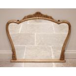 A French style carved beech wood over mantel mirror, 20th century, the foliate crest above a