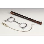 POLICE INTEREST: A pair of Dowler handcuffs with key, stamped with maker's name and partially