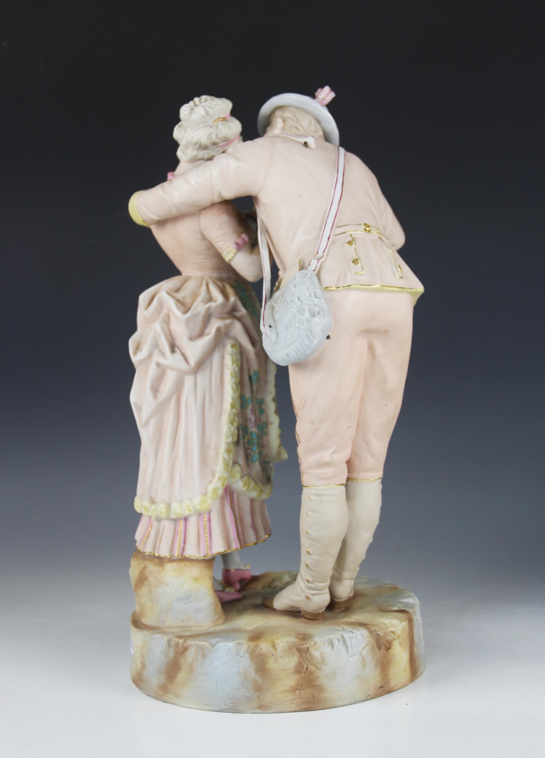 An Austrian bisque figure of a courting couple, early 20th century, gilt highlighted, 42cm high ( - Image 4 of 5