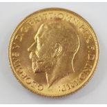 A George V sovereign, dated 1911, weight 7.9gms