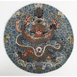 A Chinese silk embroidered circular panel/rank badge, 19th century, the circular panel embroidered