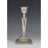 An Adam style weighted silver candlestick, Sheffield 1991 (maker's mark worn), urn shaped sconce