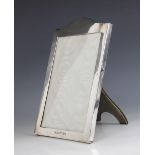 A George V silver mounted photograph frame, Goldsmiths & Silversmiths Co Ltd, London 1913, of
