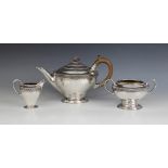 A George V three-piece silver tea service, Harold Edwin Landon, Chester 1932, each of compressed