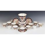 An English porcelain part tea and coffee service circa 1820, possibly Spode or Coalport, each