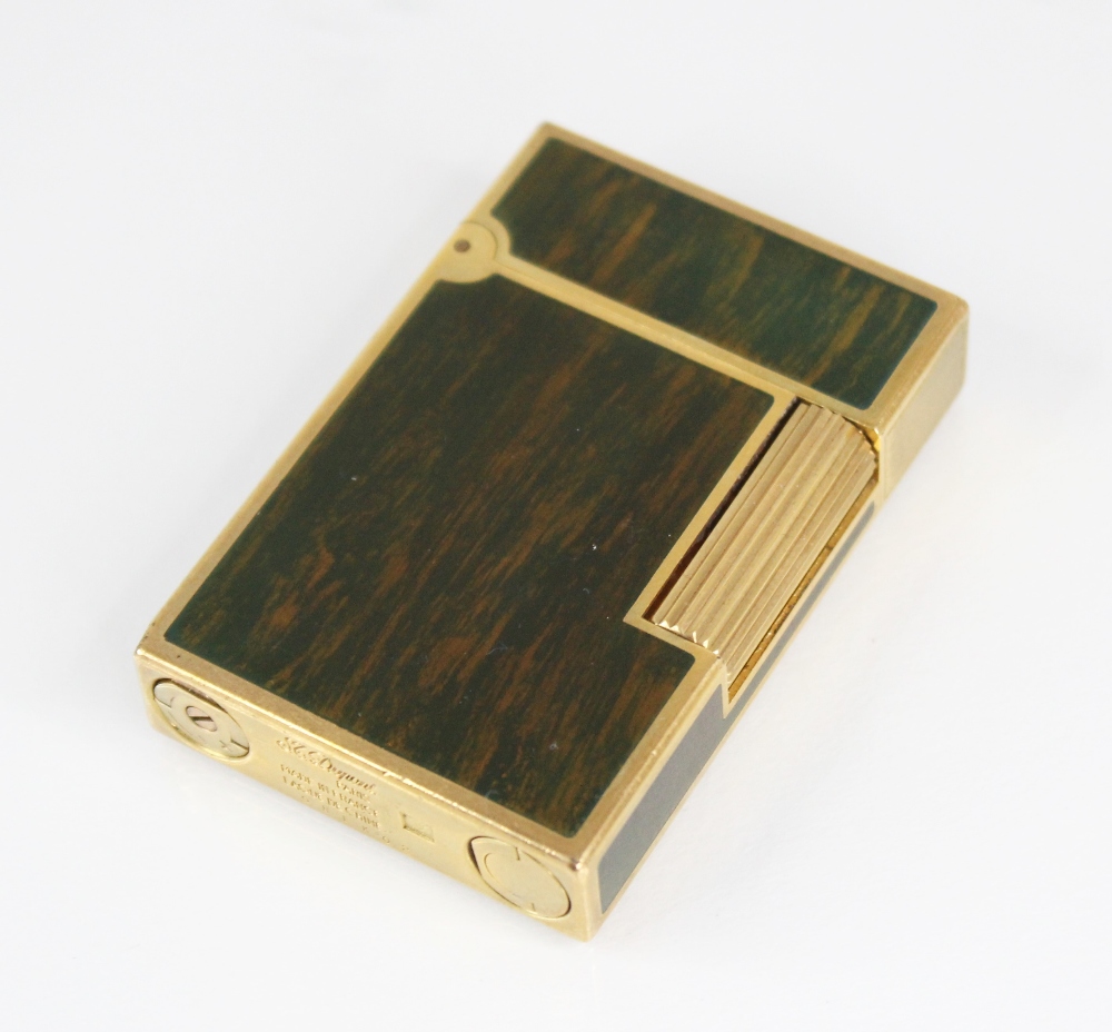 An St Dupont Laque de Chine gold plated pocket lighter, of rectangular form with wood effect - Image 4 of 5