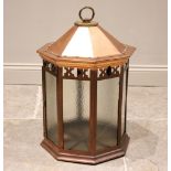 A large copper country house octagonal hall lantern, with frosted and clear glass panels below a