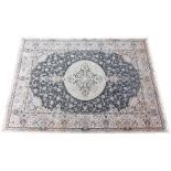 A fine woven bamboo silk carpet, the bespoke floral medallion, upon a grey ground, highlights in