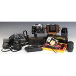 A selection of 35mm camera equipment to include a Minolta Dynax 7000i SLR camera body, a Minolta