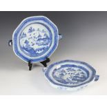 Two Chinese porcelain blue and white plate warmers, late 18th century, each decorated with a