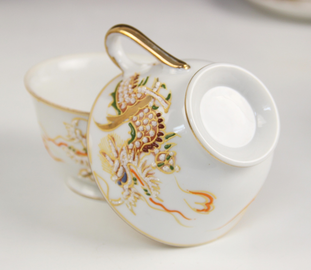 A Japanese Noritake tea service, 20th century, comprising; a teapot and cover, six teacups and - Image 7 of 7