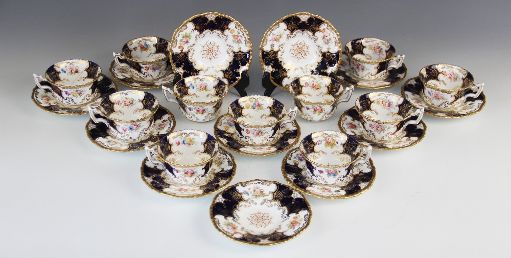 A Coalport blue batwing part coffee service, comprising eleven coffee cups and twelve saucers,