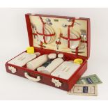 A Harrod's Brexton picnic set, mid 20th century, the fitted contents to include two food storage