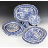 A selection of willow pattern blue and white wears, comprising: four large meat plates each 45cm