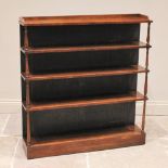 A George IV rosewood open bookcase, the three quarter galleried top shelf above three further open