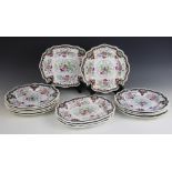 A set of fourteen 19th century plates, comprising ten dinner plates and four serving plates, each
