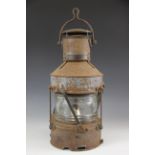 A maritime kerosene ships mast lantern by Anchor Patt, 1945, of typical cylindrical form with