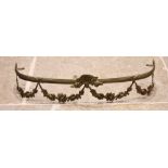A late 19th/early 20th century gilt metal rail or valance, the cast ribbon tied and reeded rail