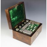 A mother of pearl inlayed rosewood travelling vanity box, 19th century, the hinged cover opening