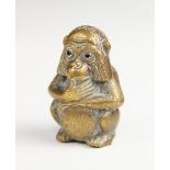 A 19th century novelty tape measure modelled as a monkey, with fur effect chasing and glass eyes,