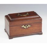 A George III mahogany tea caddy, of rectangular form, the moulded hinged cover applied with a
