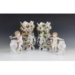 A pair of German porcelain florally encrusted vases by Possneck , 19th century, each modelled with a