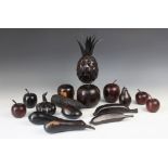 A selection of carved African hardwood fruit models, including three trinket boxes modelled as