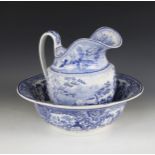 A late 19th century blue and white toilet set, comprising a wash bowl and associated jug, each