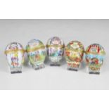Five Halcyon Days Easter eggs, comprising; 1993, 1994, 1996, 1997, and 1998, 6cm high