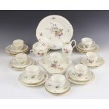 A Royal Copenhagen part tea service, comprising: eight teacups and saucers, eight side plates, a