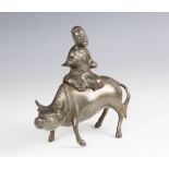 A Chinese bronze boy and buffalo incense burner, 19th century, the buffalo modelled standing with