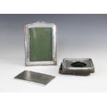 An Art Deco silver cigarette case, Mayes, Mills & Co, Birmingham 1934, of rectangular form with