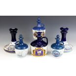 A collection of six navy rum ceramic decanters, to include; a Pusser's British Navy Rum 'HMS