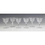 A set of six American champagne coupes by Libbey, early 20th century, each flared pressed glass bowl