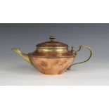 An Arts & Crafts copper and brass teapot by Benson, of compressed circular form, stamped to the