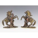 After Guillaume Coustou The Elder (French, 1677-1746), a pair of patinated bronze Marly horses, 19th