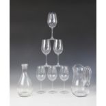 A set of six Dartington wine glasses, each 20.7cm high, together with an associated glass