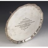 A silver presentation salver, Adie Brothers, Birmingham 1961, of circular form with shaped gadroon