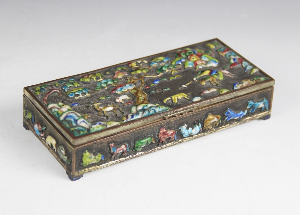 A Chinese enamelled brass box and cover, early 20th century, of rectangular form decorated with