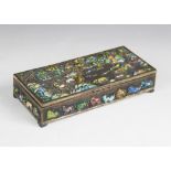 A Chinese enamelled brass box and cover, early 20th century, of rectangular form decorated with