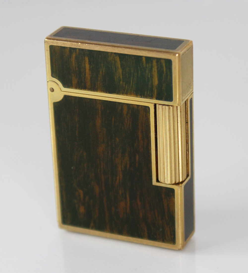 An St Dupont Laque de Chine gold plated pocket lighter, of rectangular form with wood effect - Image 2 of 5