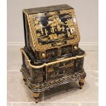 A Queen Anne style black lacquer chinoiserie bureau, late 20th century, overall adorned in gilt