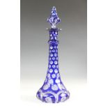 A bohemian blue flashed glass liqueur decanter and stopper, of trumpet form with all over circular