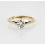 A diamond solitaire ring, the central round brilliant cut diamond weighing approximately 0.50