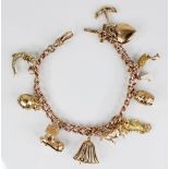 A Victorian 9ct gold charm bracelet, the curb link bracelet with later claw fastening, 18cm long,