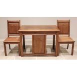 A mid 20th century honey oak altar table and two conforming side chairs, the table with a