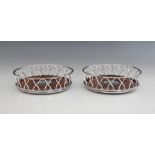 A pair of George III silver mounted bottle coasters, William Allen III, London 1802, each of
