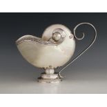 A Tiffany & Co silver mounted nautilus shell ewer, 20th century, the shell of typical form with rope