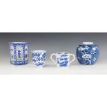 A selection of Chinese and Japanese porcelain blue and white wares, comprising; a prunus pattern