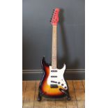 A Stagg Stratocaster copy electric guitar, with sunburst body, rosewood neck and later painted